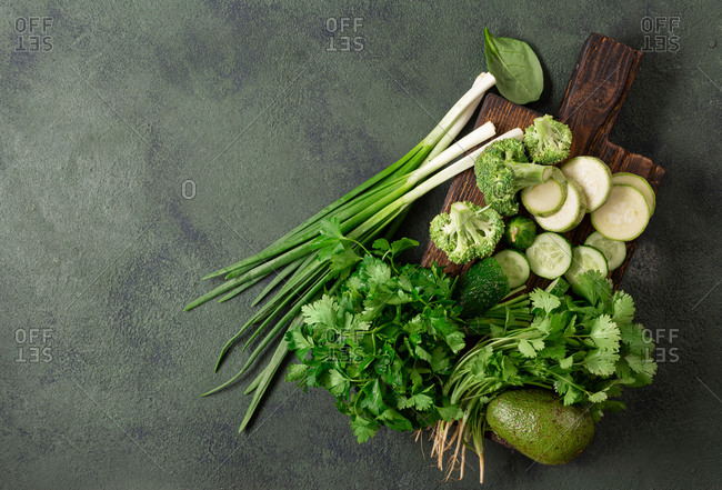 Clean eating concept Fresh green food, variety of vegetables top view