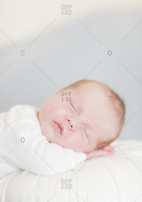 Newborn baby boy sleeping up close