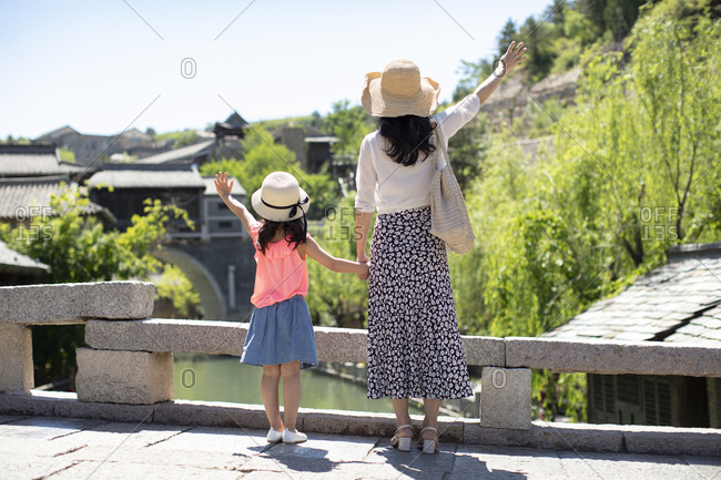Chinese mother and daughter enjoying vacation