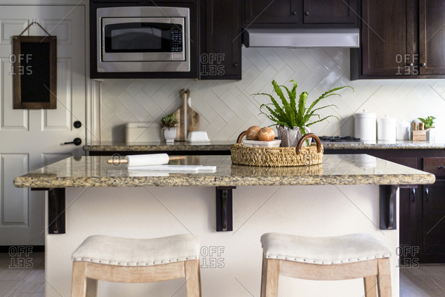 Vegetables and Plant on a kitchen island