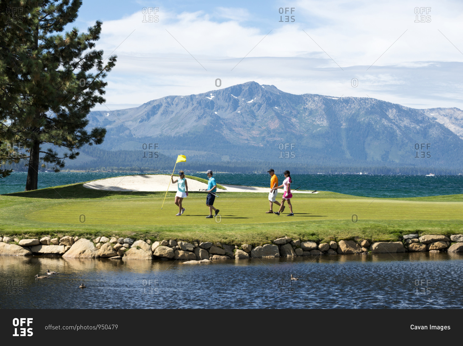 A group of friends golfing at Edgewood Tahoe in Stateline, Nevada.
