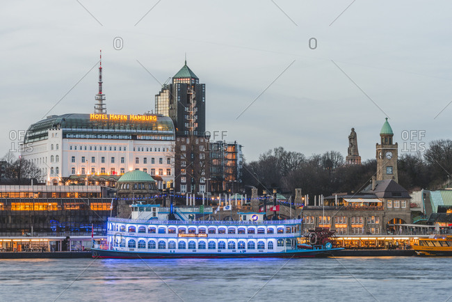 April 6, 2018:  - April 6, 2018: Germany- Hamburg- Bornsteinplatz- View over Elbe river to St. Pauli Landing Stages in the evening