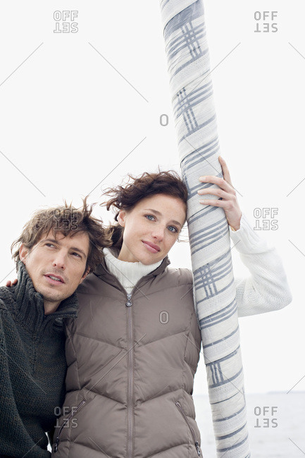 Germany- Baltic Sea- Lubecker Bucht- Young couple on sailing boat- portrait