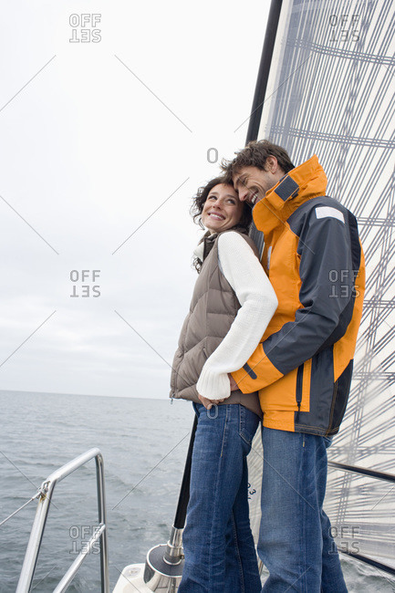 Germany- Baltic Sea- Lubecker Bucht- Young couple on sailing boat