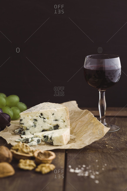 Roqufort cheese with walnuts and red wine grapes