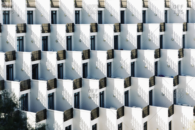 Spain- Baleares- Mallorca- apartment building with rows of balconies