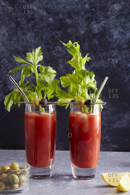 Two Bloody Mary cocktails with sustainable straws