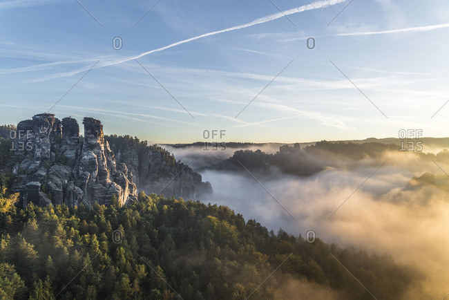 Small goose rock at sunrise, Elbe Sandstone Mountains, Saxony, Germany
