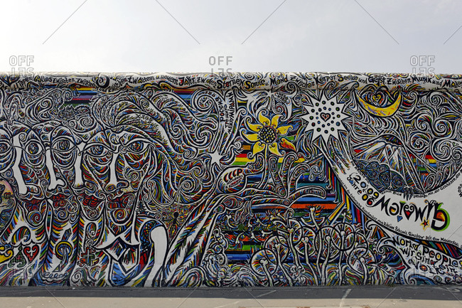 July 2, 2010: Artwork of Schamil Gimajev, Berlin Wall, East Side Gallery, Muehlenstrasse, Friedrichshain, Ostbahnhof, Berlin, Germany