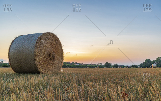 Rural village with straw bales at sunset on the Mediterranean coast