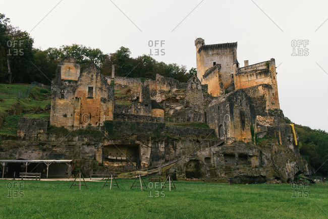 The crumbling facade of the medieval Castle Commarque