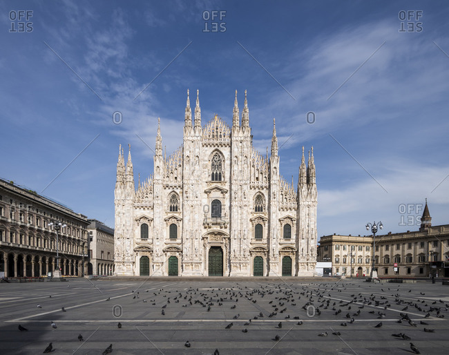 Italy- Milan- Flock of birds at Piazza del Duomo during COVID-19 outbreak