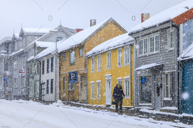March 6, 2020: Historic central district, colorful wooden houses, heavy snow in winter, Tromso, Troms og Finnmark, Arctic Circle, North Norway, Scandinavia, Europe