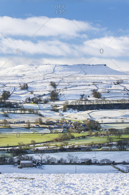 Fresh snow and winter sunshine covering the fell tops in Wensleydale around Nappa Scar and Addlebrough, North Yorkshire, England, United Kingdom, Europe