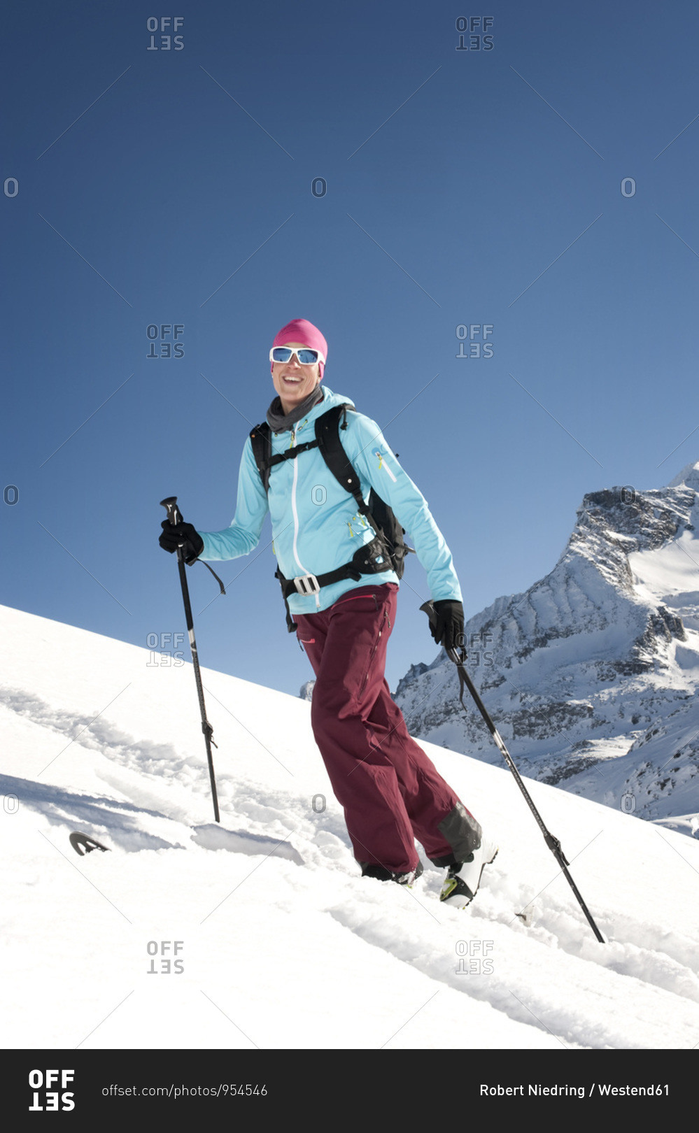 Austria- Woman skiing on mountain at Salzburger Land stock
photo - OFFSET