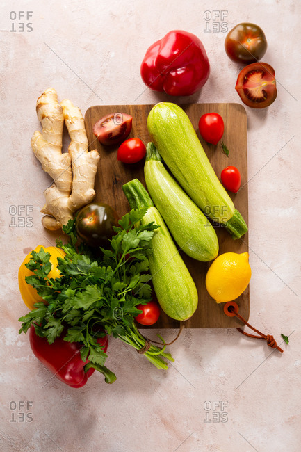 Overhead view of fresh vegetables on kitchen board