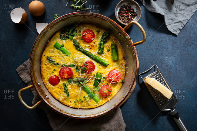 Overhead view of spinach and asparagus frittata