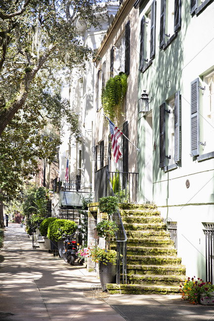 Exterior of building with moss covered steps on a residential street in downtown Savannah, Georgia