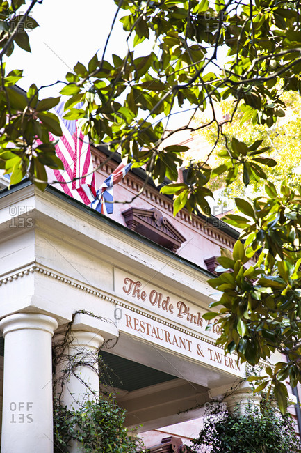 Savannah Georgia - March 7, 2019: Low angle view of sign on The Olde Pink House restaurant exterior