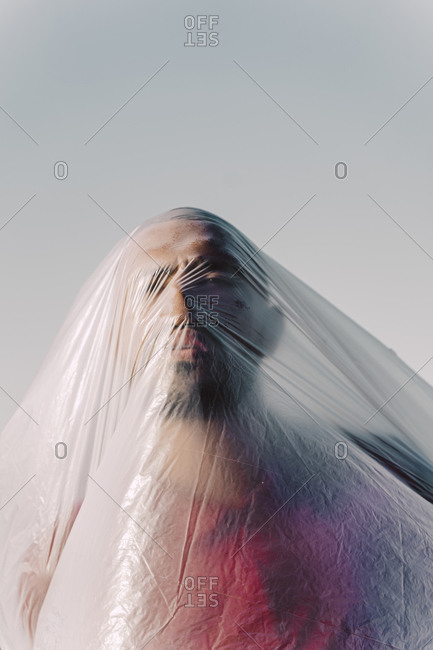 Man trapped in a plastic foil