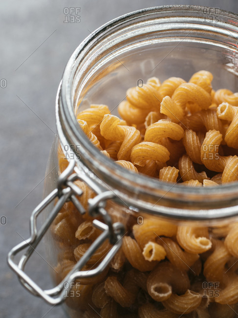 Jar with organic lupine pasta, whole meal pasta with lupine flour