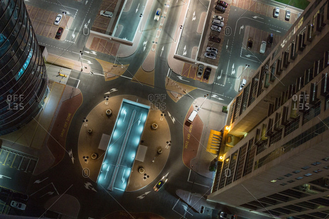 Overhead view, night scene, carpark below office buildings, Dubai, UAE