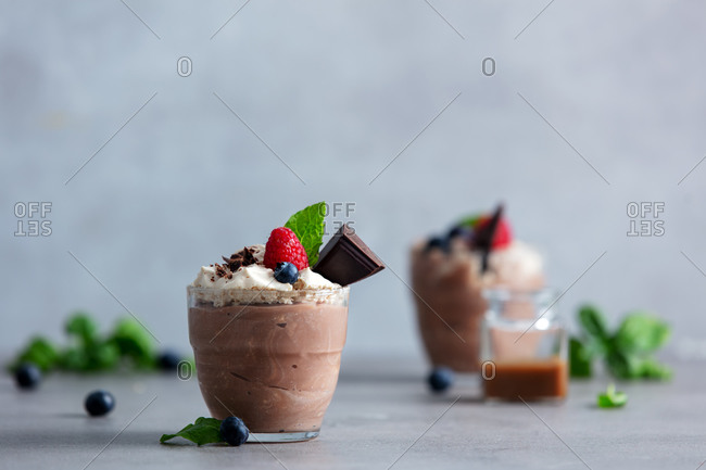 Ice cream cones in glass containers stock photo - OFFSET