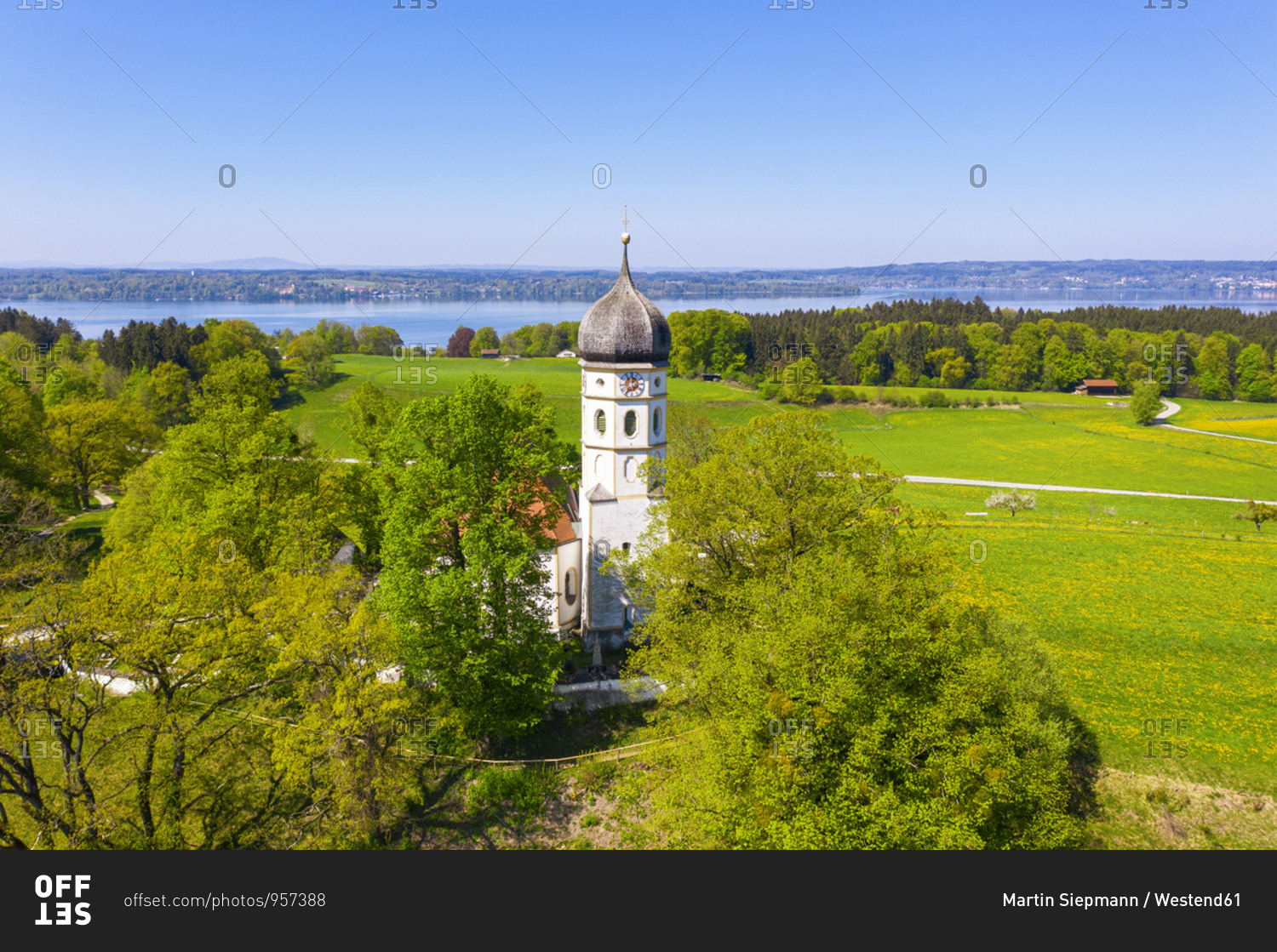 Germany- Bavaria- Munsing- Drone view of Church of Assumption of Virgin Mary in spring