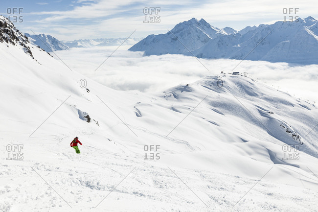 Austria- Vorarlberg- Man skiing in Arlberg massif