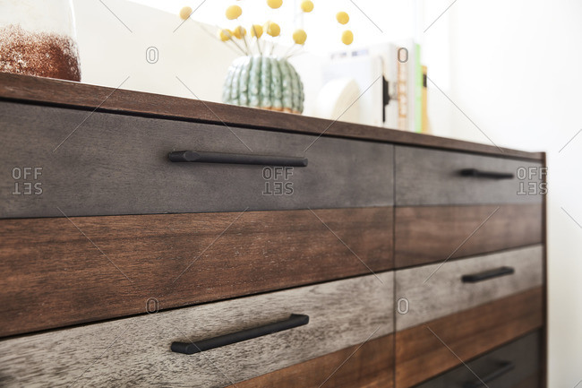 Bedroom dresser with rustic blue and wooden detail