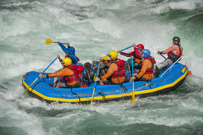 Rafting through white water rapids on the Karnali river in west Nepal