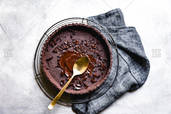 Caramel spread over a chocolate tart crust base.
