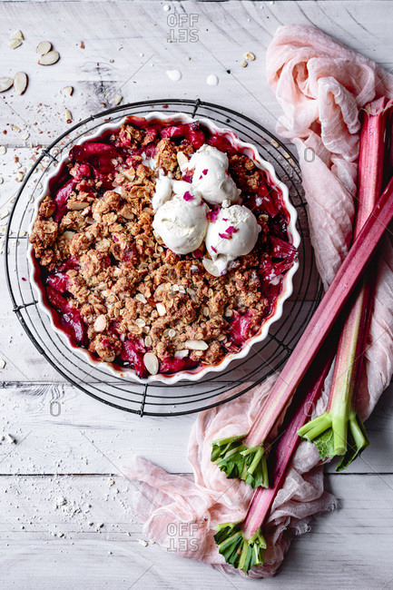 Rhubarb crisp with scoops of ice cream.