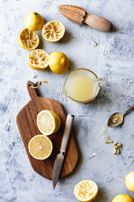 Overhead view of lemons cut and juiced.