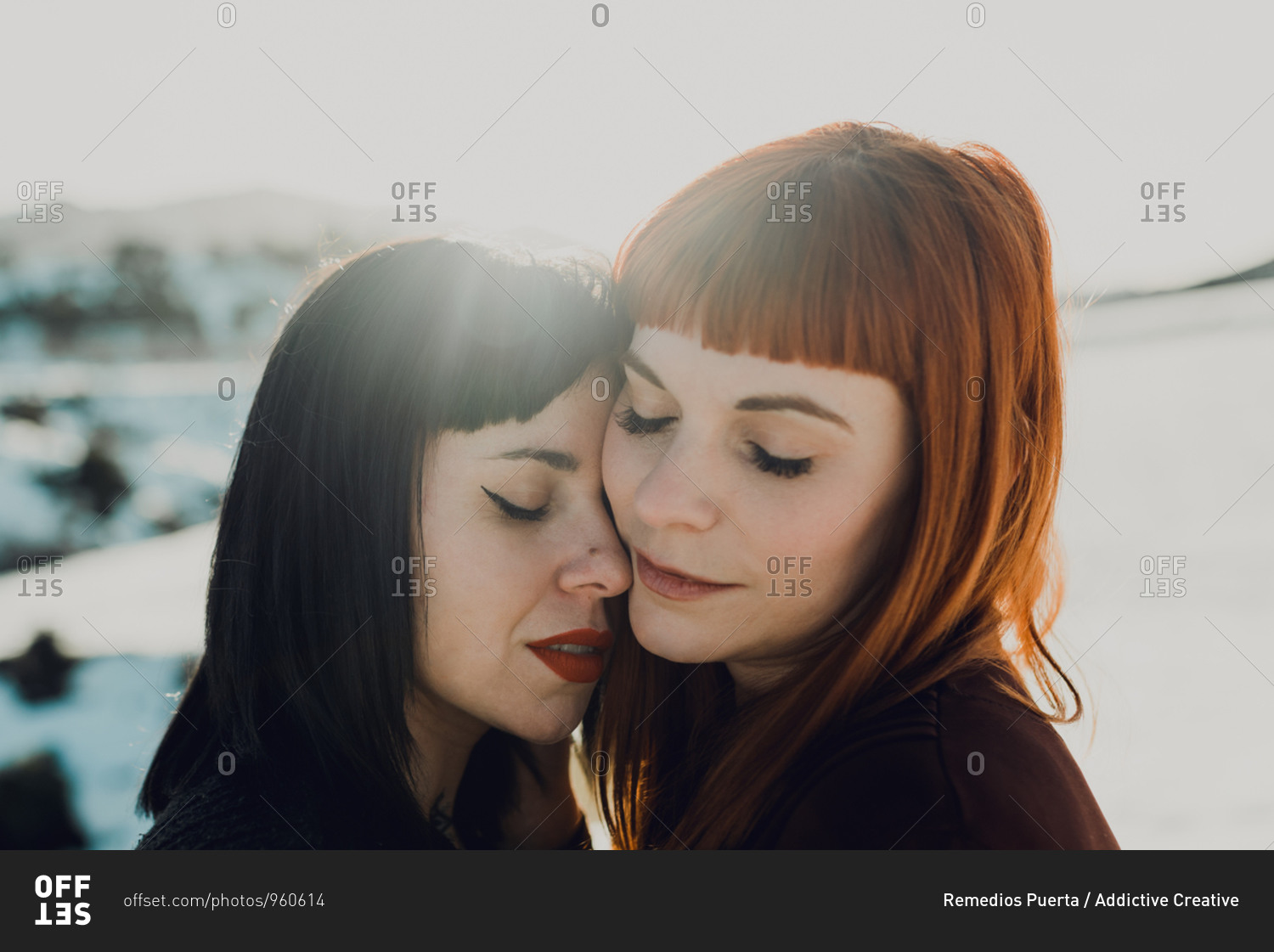 Side View Of Modern Sensual Lesbian Couple In Love Embracing While