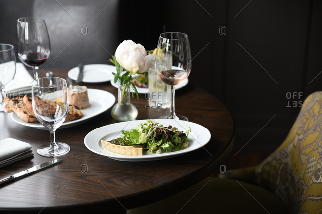 Gourmet dinner served in a restaurant with wine