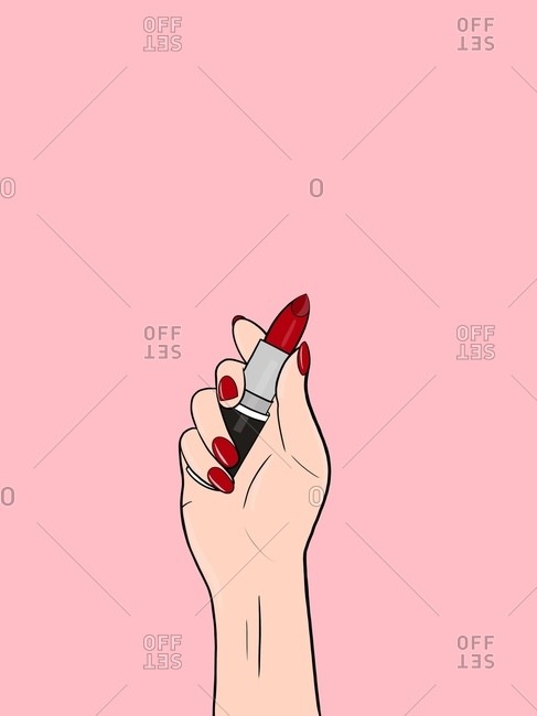 Girl with red nail polish is holding in her hand a red lipstick