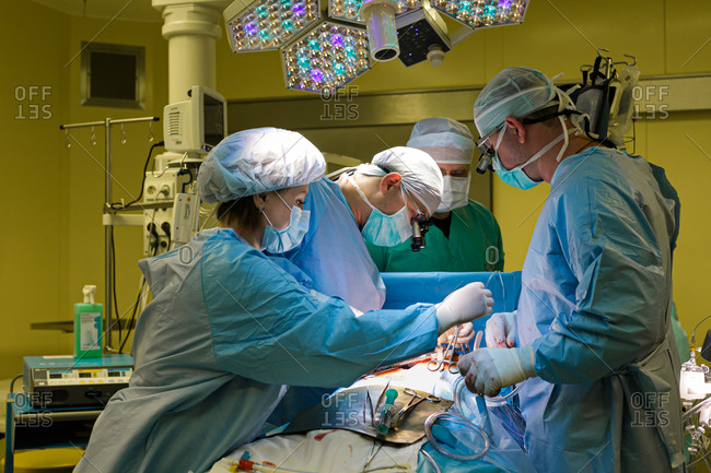 Surgery being performed in a hospital operating room