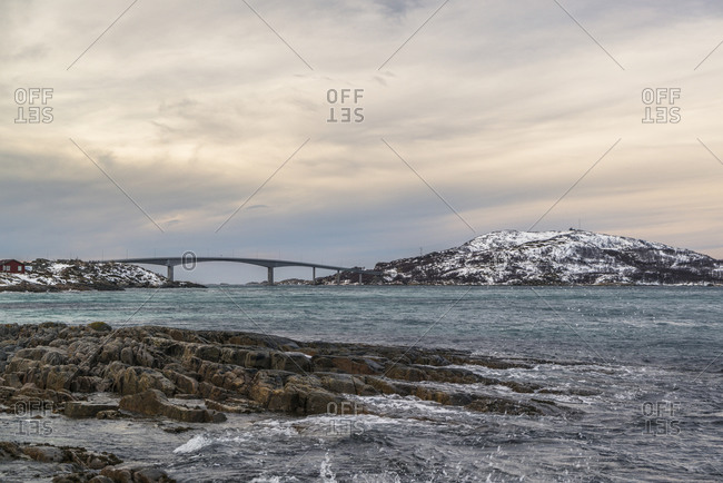 Coastal landscape of the island Kvaloya with view to the island Summary, Norway