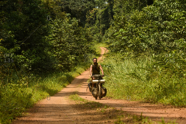 September 18,  2015: Cycling in the equatorial rainforest of Gabon, Central Africa