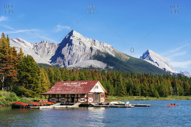 Canada - August 21, 2019: Maligne Lake Boat House with canoa and blue sky, Jasper National Park, Alberta, Canada