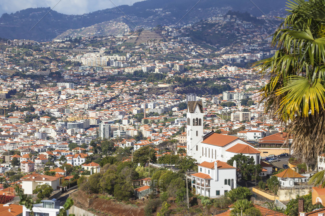 Portugal, Madeira, Funchal, View of Sao Goncalo Church overlooking Funchal harbor and town