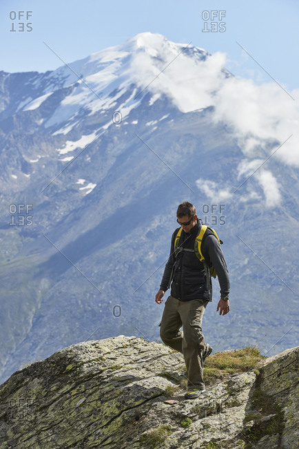 Hiker enjoying walk, Saas-Fee, Valais, Switzerland
