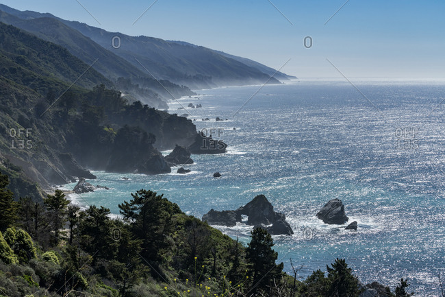 USA, California, Big Sur, Seascape with cliffs and rock formations on sunny day