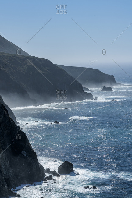USA, California, Big Sur, Seascape with cliffs and rock formations on sunny day