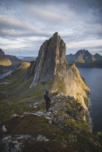 Norway, Senja, Man hiking near Segla mountain