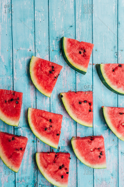 Slices of watermelon on a blue background