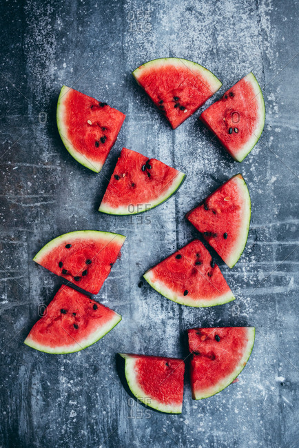 Slices of watermelon on a dark background