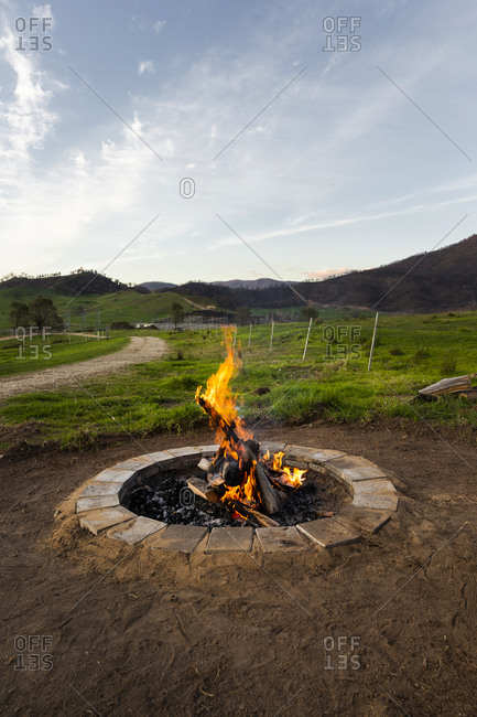 Large bonfire in rural setting