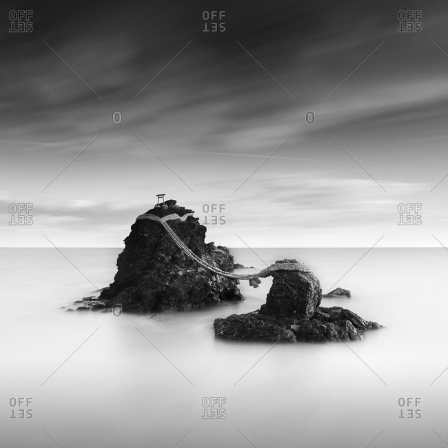 Long exposure shot of Meoto-iwa rock and clouds in the morning, Mie Prefecture, Japan